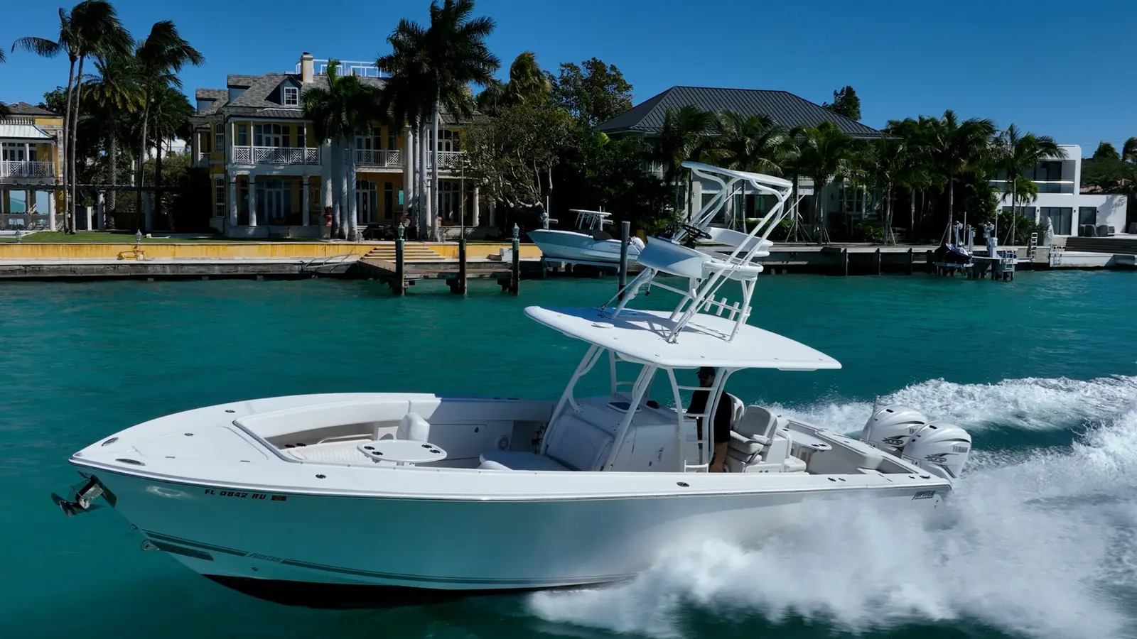The 2019 Jupiter 38 HFS running past waterfront homes in Coral Gables, Florida